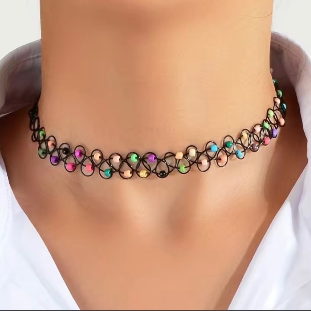 90S style stretch choker with beads.  Stunning new in package